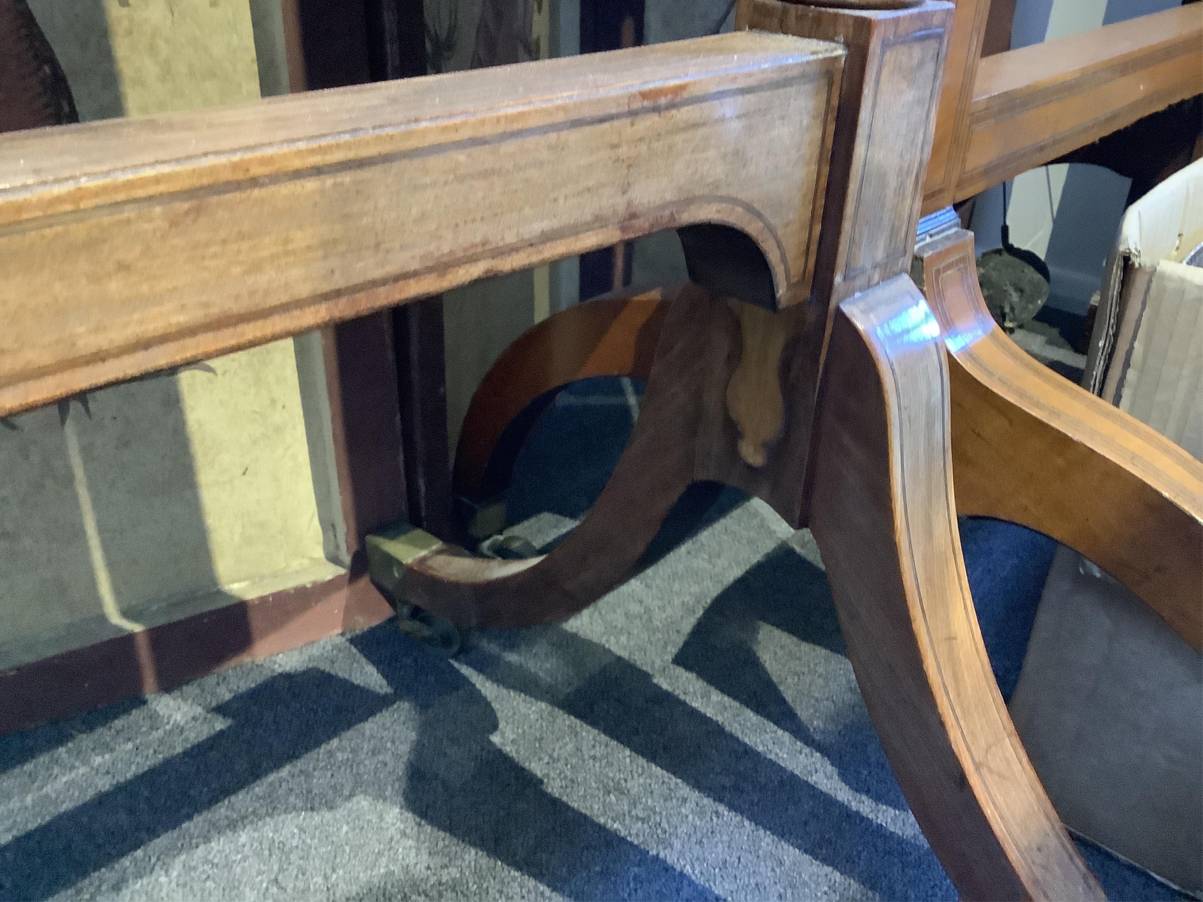 A Regency inlaid mahogany cheval mirror